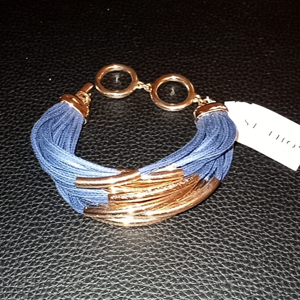 Dark blue bracelet with gold accent in the middle